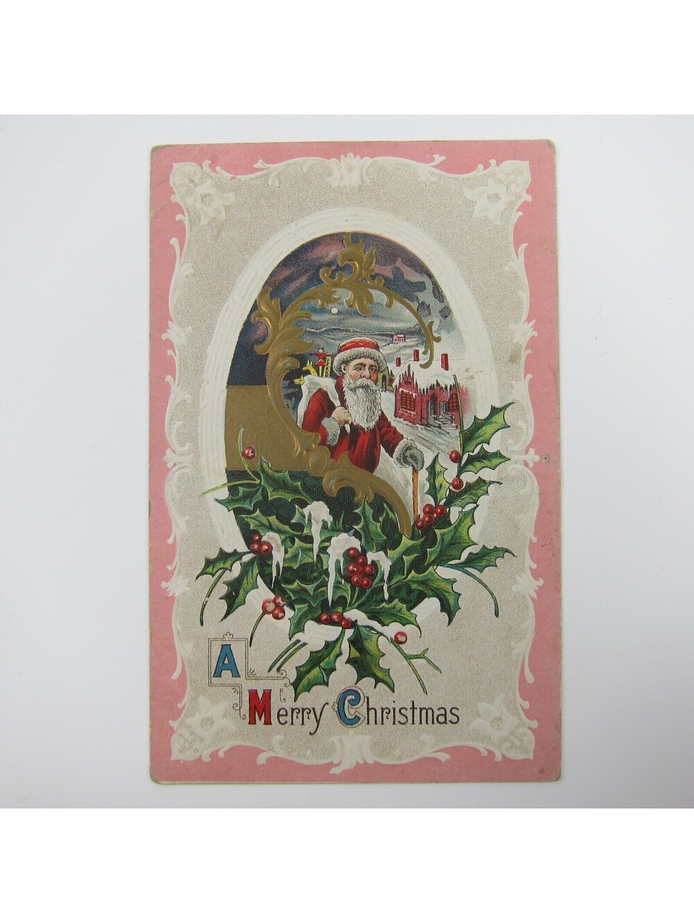 Vintage Christmas Postcard Santa Snowy Town Night Holly Gold Embossed Antique